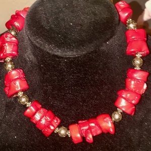 Chunky bamboo coral and sterling silver clasp and beads.